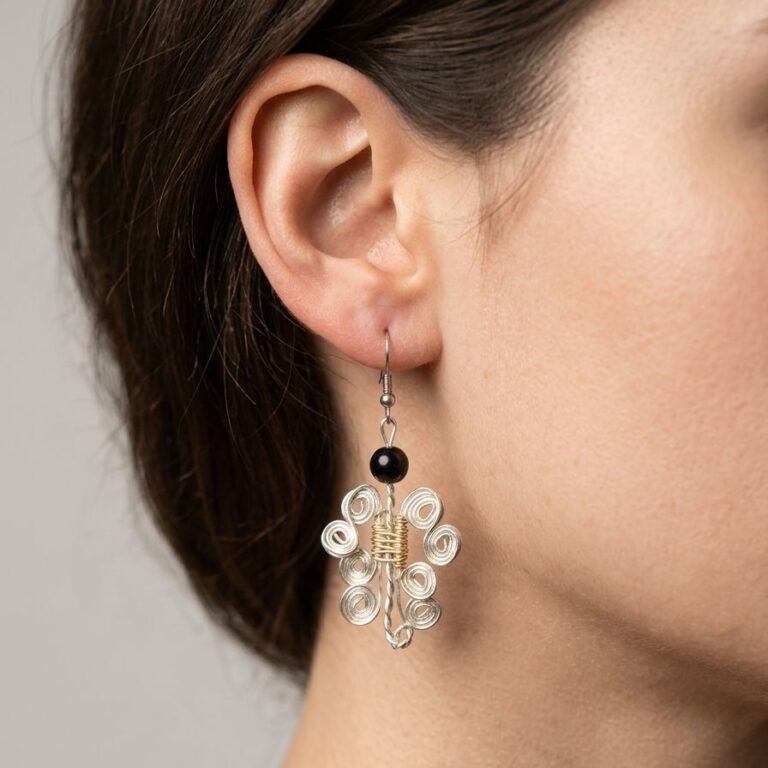 arete color olata con perla negra